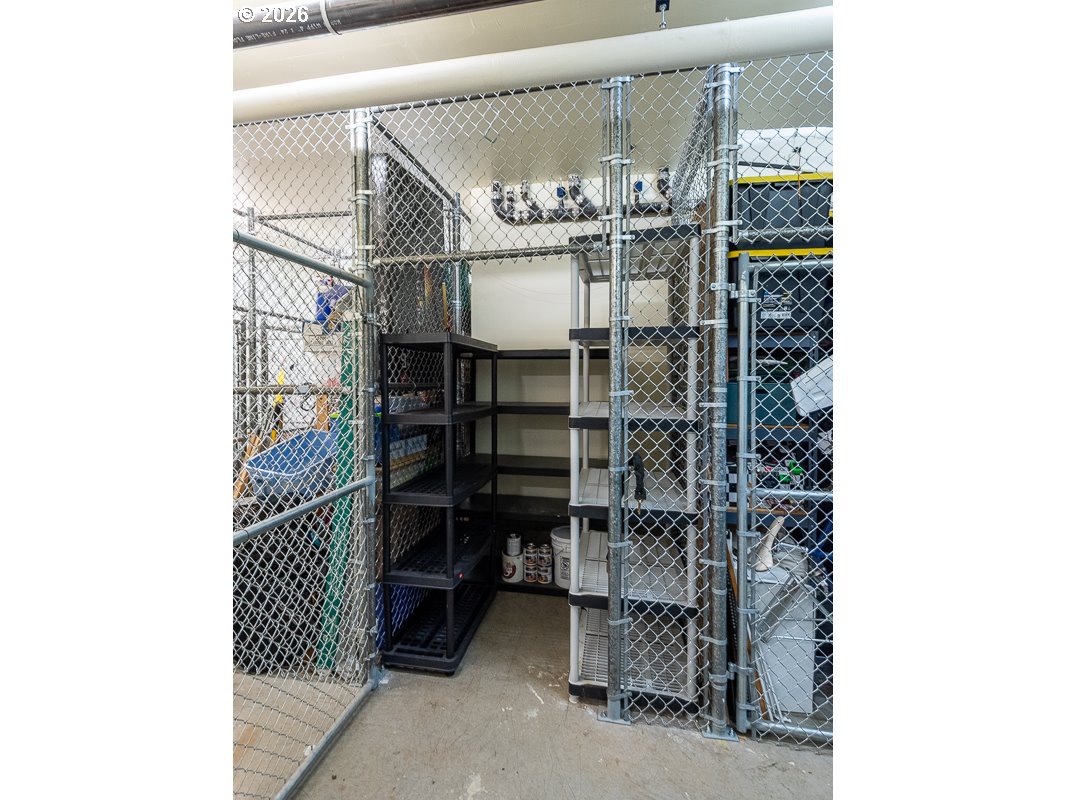3970 North Interstate Avenue, Unit 208 Portland, OR 97227 - Photo 15 of 20 a room with shelves and a chandelier