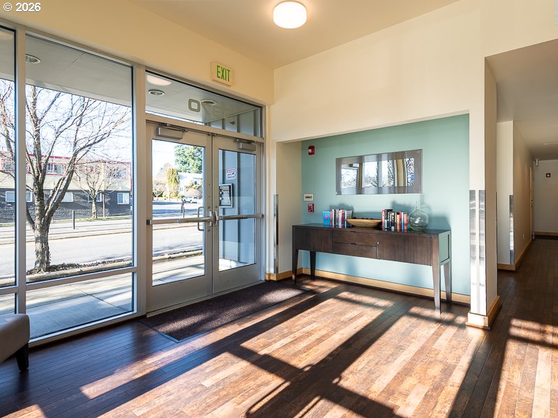 3970 North Interstate Avenue, Unit 208 Portland, OR 97227 - Photo 17 of 20 a living room with a floor to ceiling window and a table