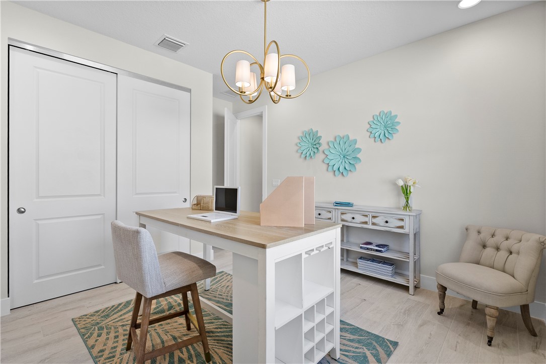 2148 Falls Manor Vero Beach, FL 32967 - Photo 20 of 25 a view of kitchen and sink