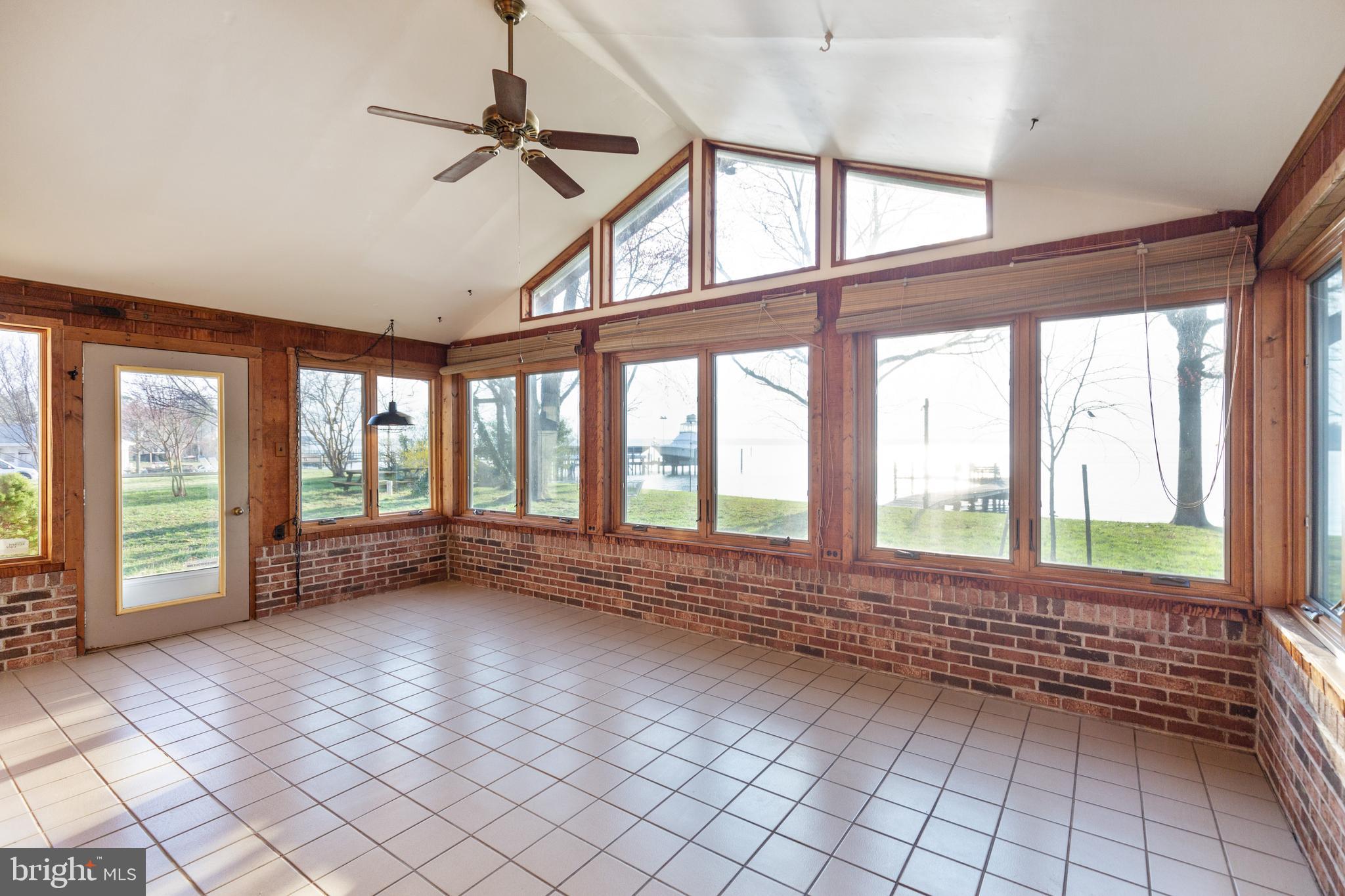 4144 School Road Broomes Island, MD 20615 - Photo 15 of 45 Waterside Sunroom, ceramic tiles, new windows
