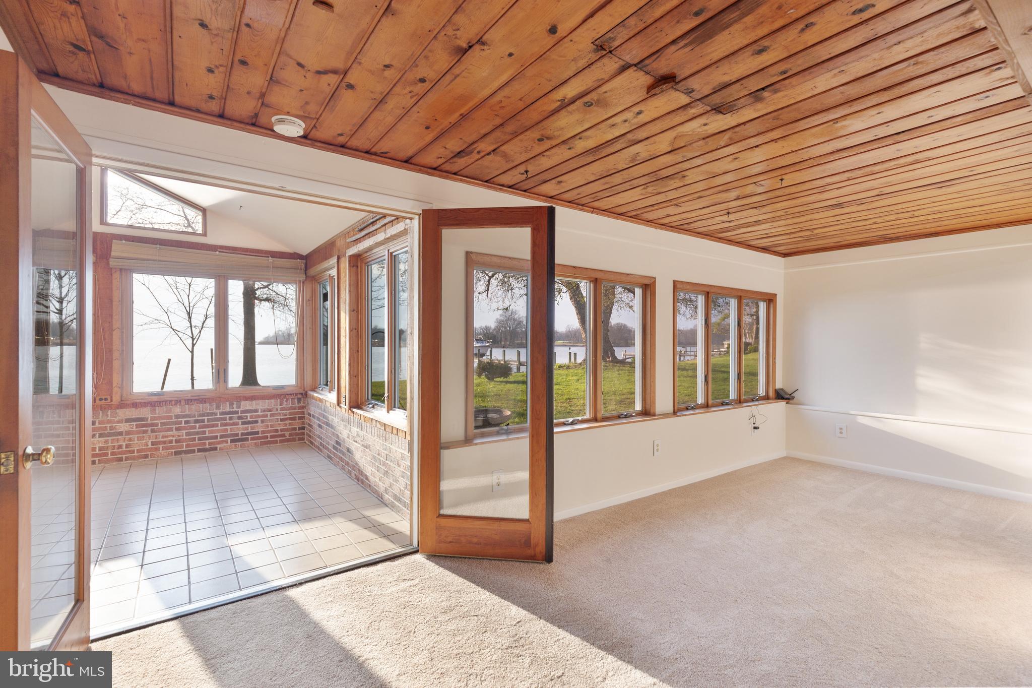 4144 School Road Broomes Island, MD 20615 - Photo 20 of 45 Dining Room, new carpeting, opens to Sunroom