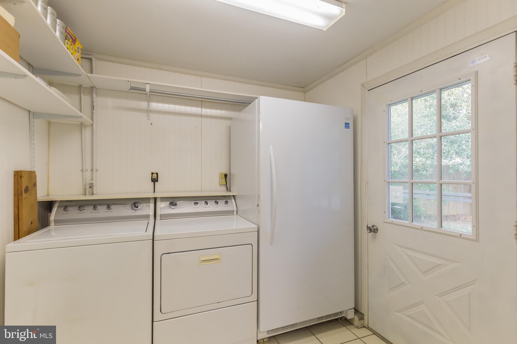 4144 School Road Broomes Island, MD 20615 - Photo 26 of 45 Utility Room w/washer/dryer and huge freezer!