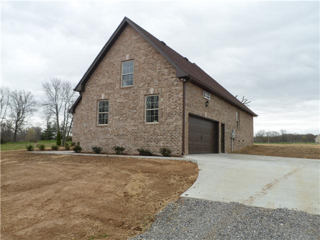 532 Halltown Road Portland, TN 37148 - Photo 4 of 15 a front view of a house with a yard