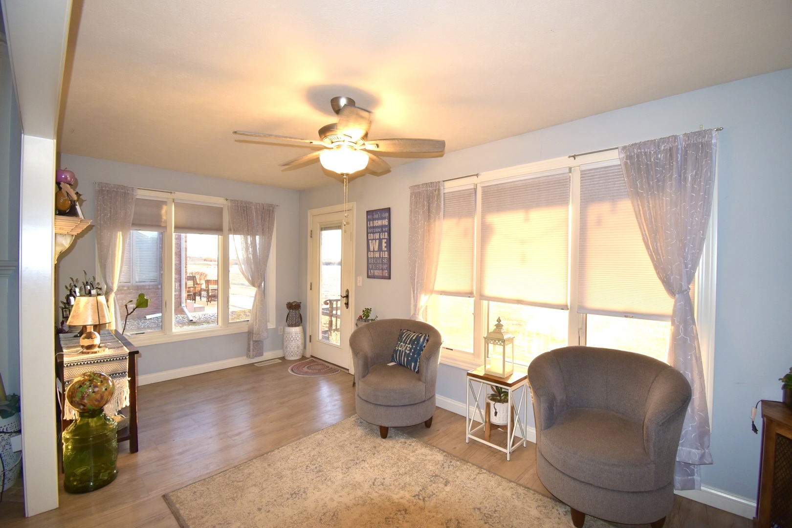 1915 Dunraven Road Bloomington, IL 61704 - Photo 13 of 26 a living room with furniture and a large window
