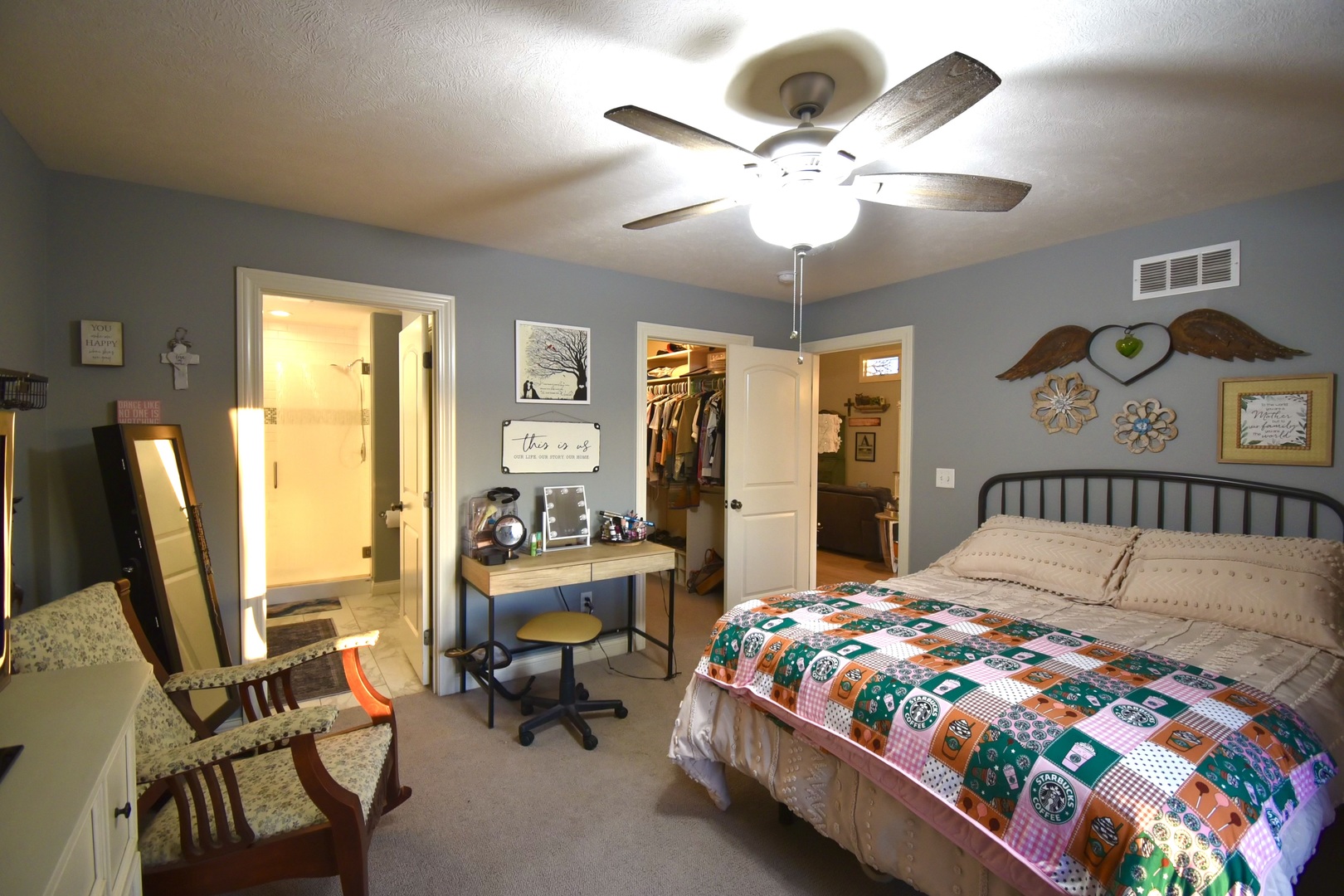 1915 Dunraven Road Bloomington, IL 61704 - Photo 14 of 26 a bedroom with a bed a large window and furniture