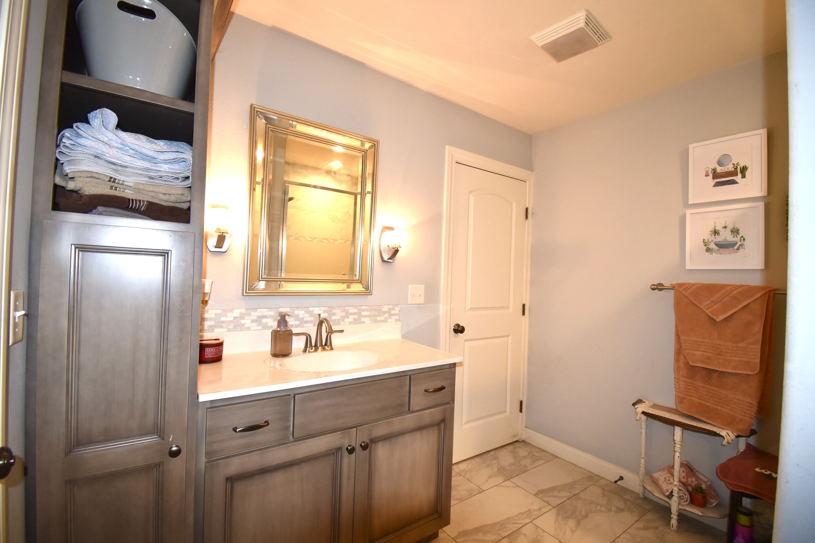 1915 Dunraven Road Bloomington, IL 61704 - Photo 19 of 26 a bathroom with a sink and a mirror