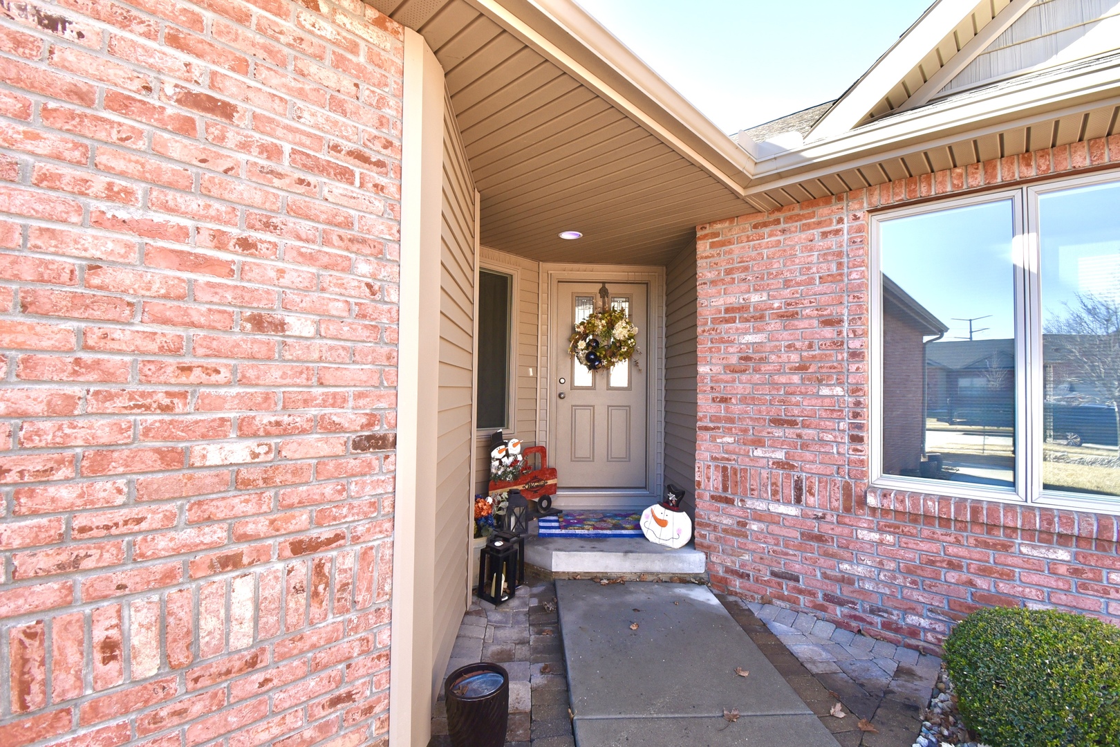 1915 Dunraven Road Bloomington, IL 61704 - Photo 2 of 26 a front view of a house with a backyard