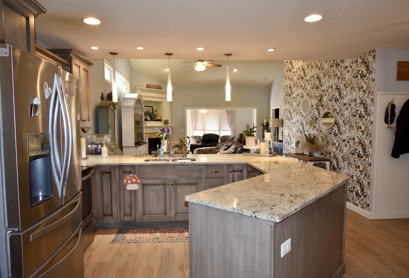1915 Dunraven Road Bloomington, IL 61704 - Photo 5 of 26 a kitchen with stainless steel appliances granite countertop a refrigerator and a sink