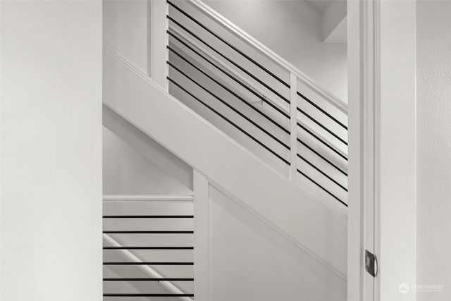 a car parked in front of a brick house