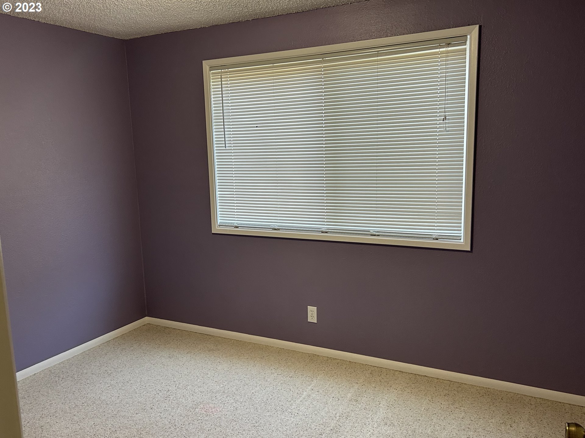 6558 Thurston Road Springfield, OR 97478 - Photo 16 of 26 a view of an empty room with a window