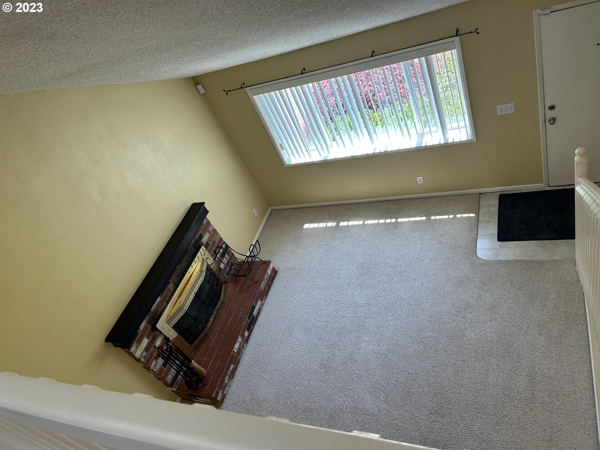 6558 Thurston Road Springfield, OR 97478 - Photo 4 of 26 a view of a room with wooden floor and windows