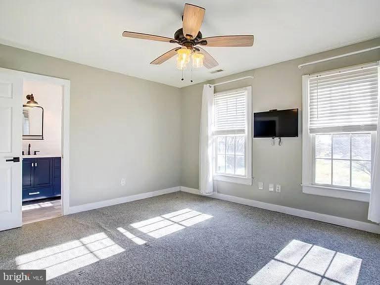 12148 Atlantic Road Temperanceville, VA 23442 - Photo 15 of 30 a view of an empty room with a window