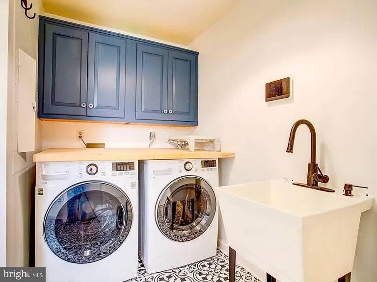 12148 Atlantic Road Temperanceville, VA 23442 - Photo 19 of 30 a utility room with dryer and washer
