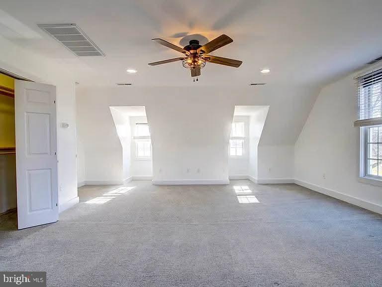 12148 Atlantic Road Temperanceville, VA 23442 - Photo 29 of 30 a view of a livingroom with a ceiling fan and window