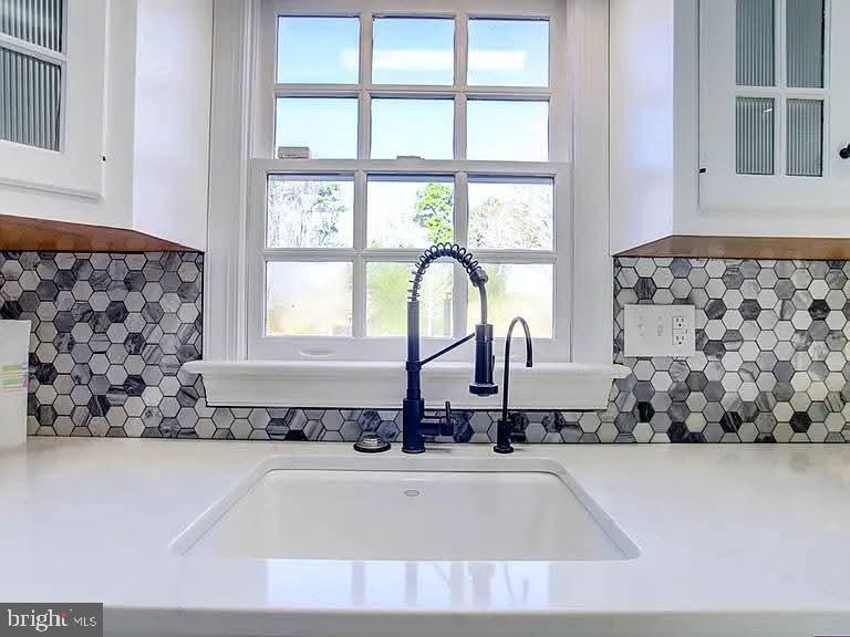 12148 Atlantic Road Temperanceville, VA 23442 - Photo 4 of 30 a view of a bathroom with bathtub and shower