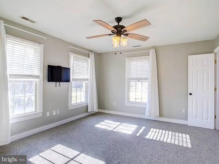 12148 Atlantic Road Temperanceville, VA 23442 - Photo 10 of 30 a view of livingroom with window