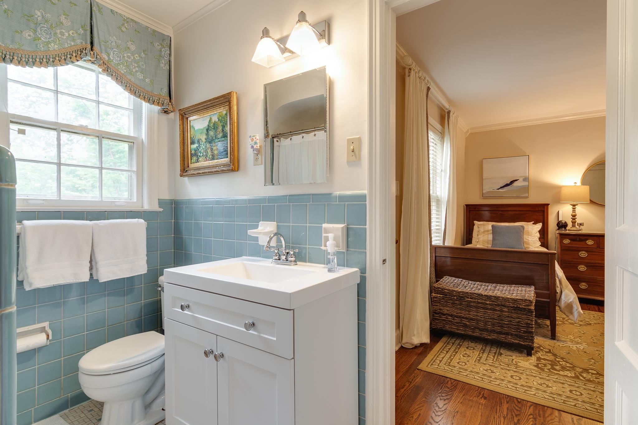 263 North Rose Road Memphis, TN 38117 - Photo 17 of 25 a bathroom with a sink a toilet and a mirror