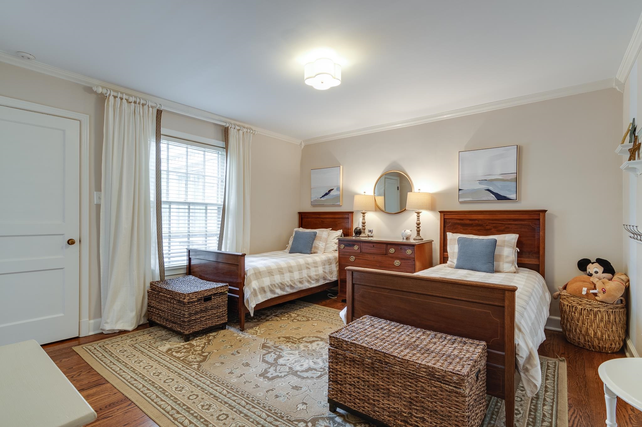 263 North Rose Road Memphis, TN 38117 - Photo 18 of 25 a bedroom with a bed and wooden floor
