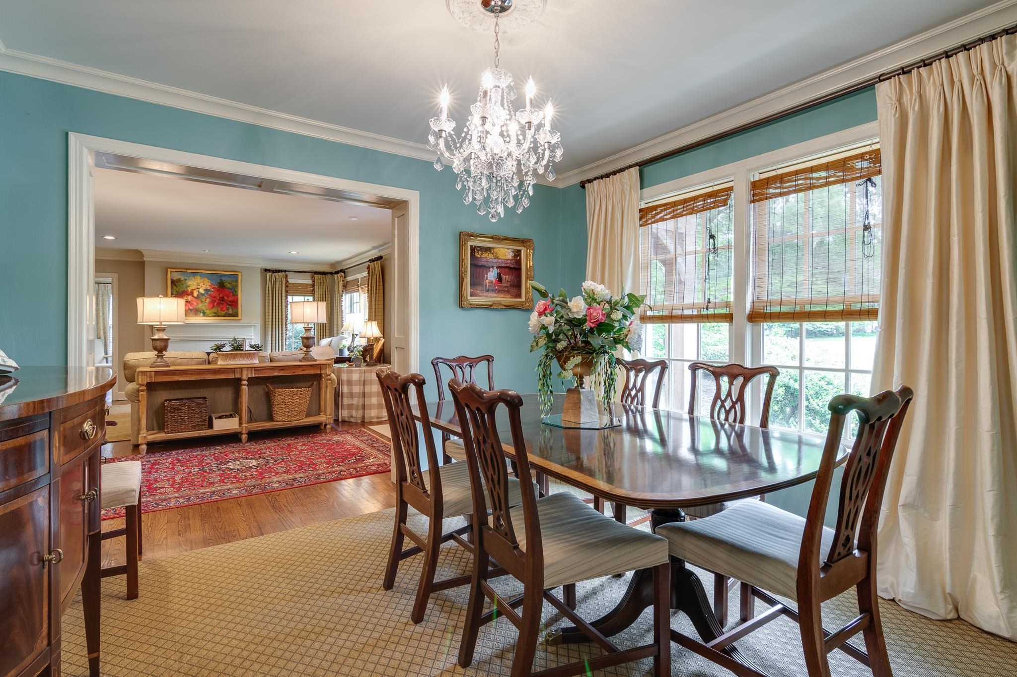 263 North Rose Road Memphis, TN 38117 - Photo 6 of 25 a view of a dining room with furniture and a chandelier