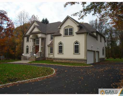 3 Fishel Road Edison, NJ 08820 - Photo 3 of 10 a front view of a house with a yard