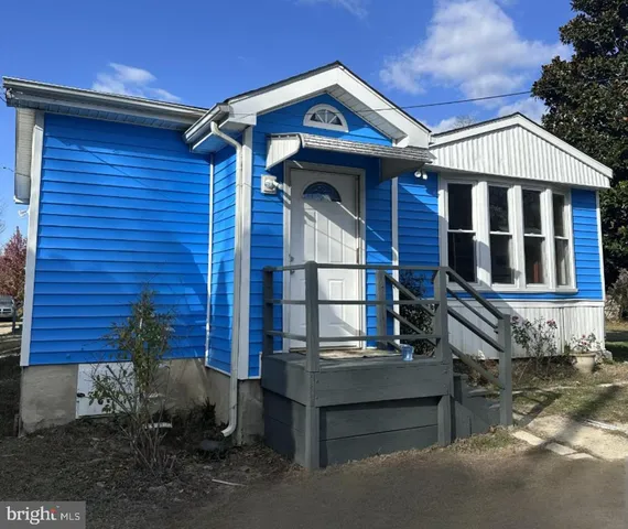 a front view of a house with balcony