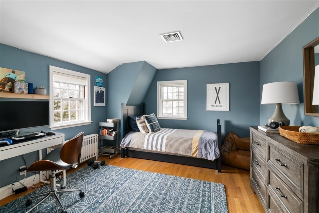 8 Rockwood Road Hingham, MA 02043 - Photo 17 of 27 a bedroom with furniture and a window