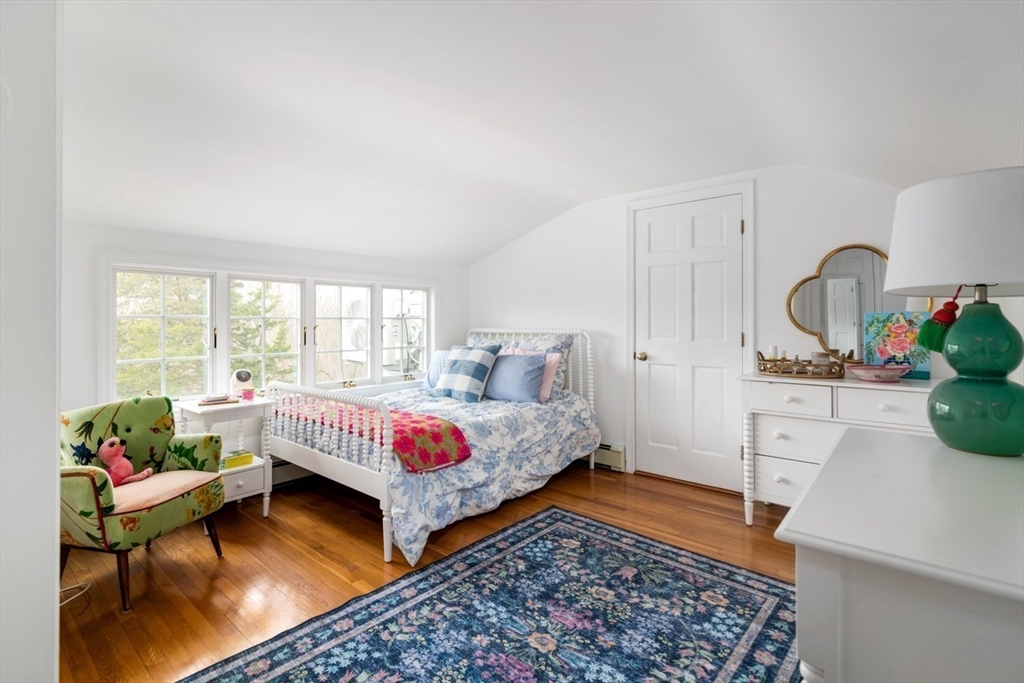 8 Rockwood Road Hingham, MA 02043 - Photo 20 of 27 a bed room with a bed and a window