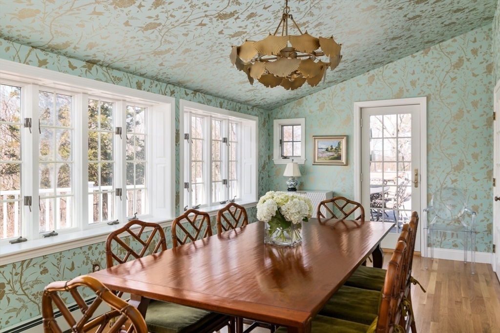 8 Rockwood Road Hingham, MA 02043 - Photo 8 of 27 a view of a dining room with furniture window and wooden floor