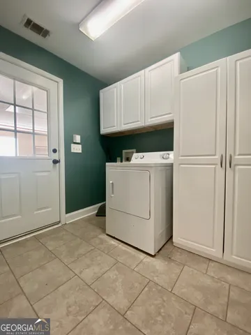a white refrigerator freezer and a dishwasher in a kitchen