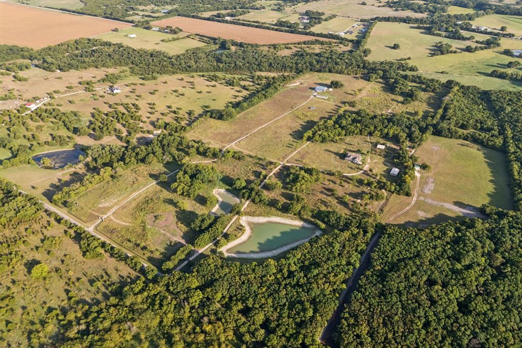9530 County Road 581 Anna, TX 75409 - Photo 3 of 39 an aerial view of residential house with pool and garden