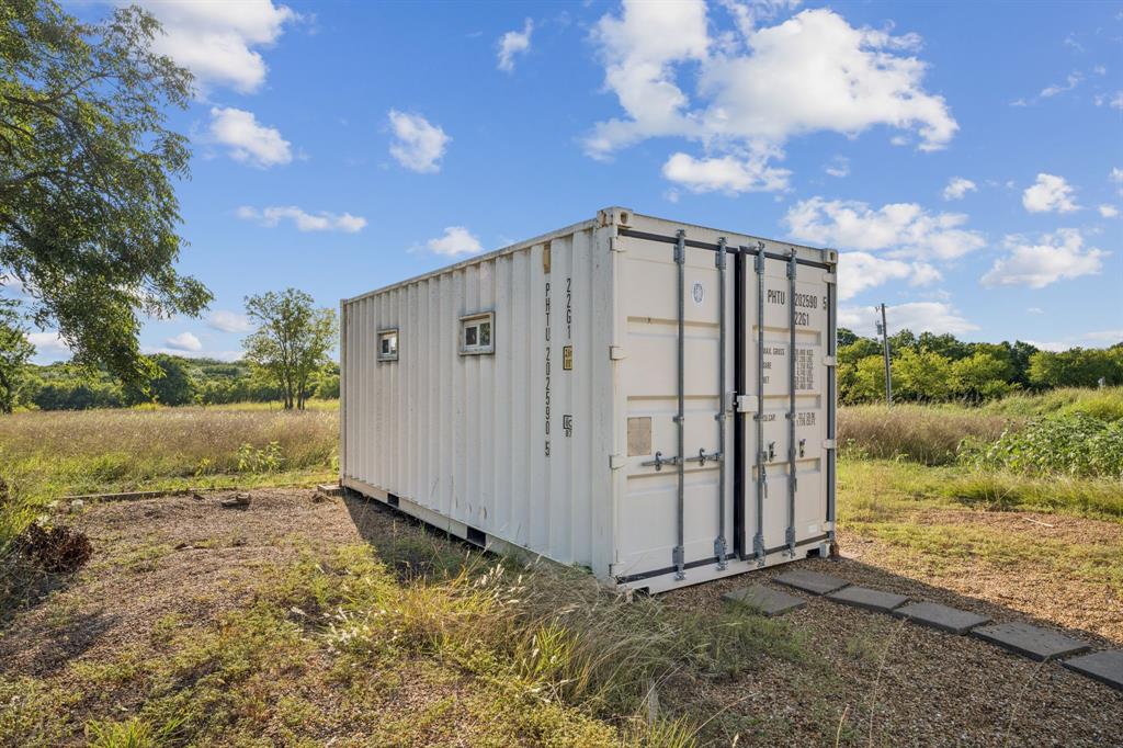 9530 County Road 581 Anna, TX 75409 - Photo 36 of 39 a view of a entrance gate of the house and a yard