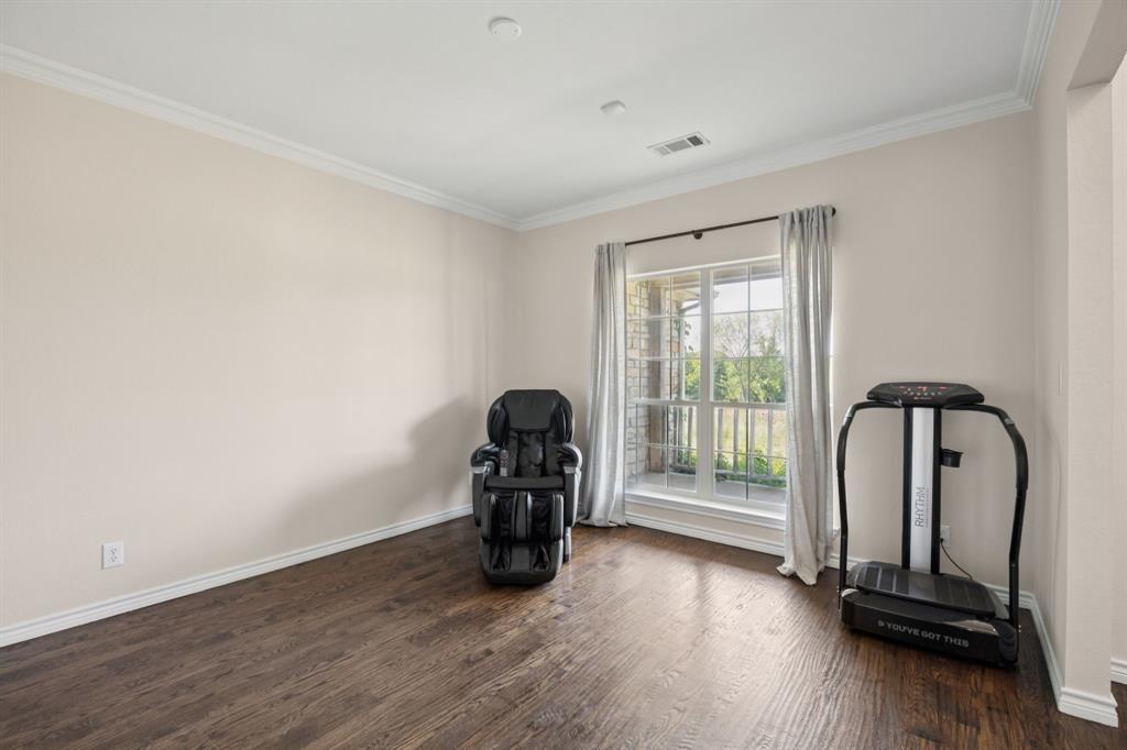 9530 County Road 581 Anna, TX 75409 - Photo 8 of 39 a view of workspace with wooden floor and windows