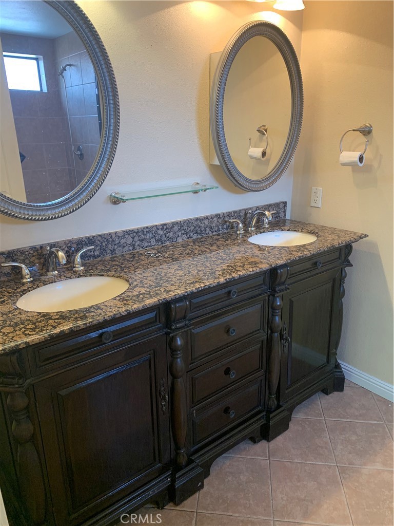 5246 Calderon Road Woodland Hills, CA 91364 - Photo 12 of 50 Master suite bath dbl vanity with cabinets in mirrors