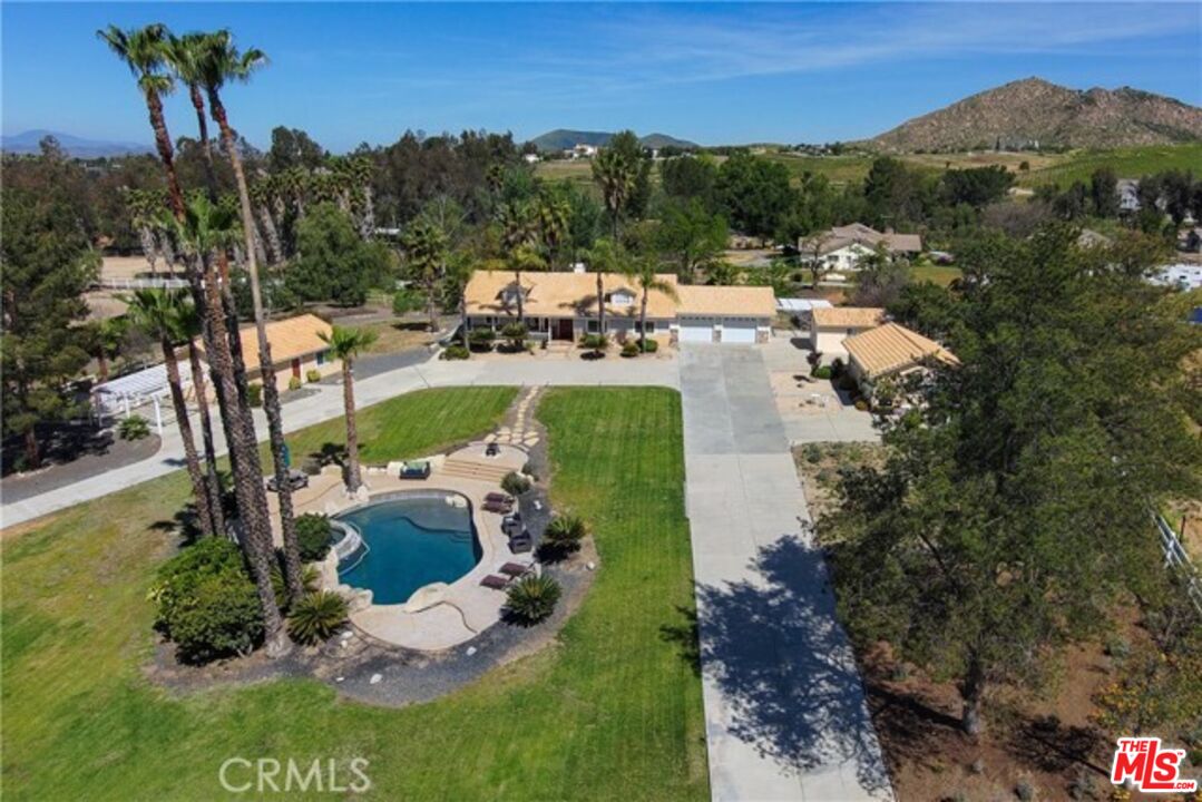 37200 Glen Oaks Road, Unit 3 Temecula, CA 92592 - Photo 16 of 42 an aerial view of a house with a garden