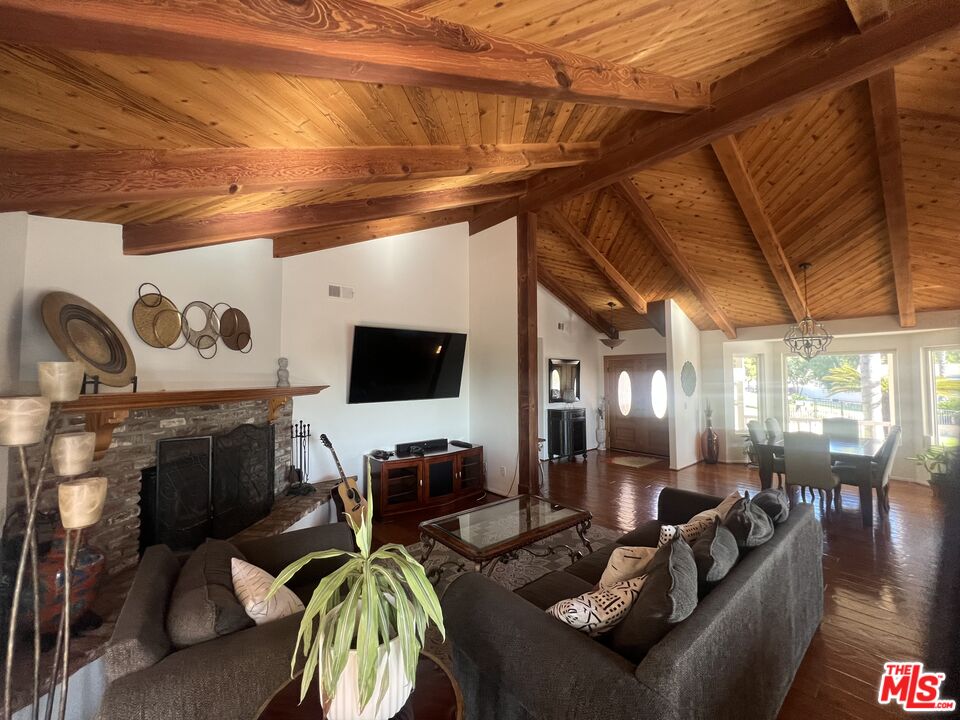 37200 Glen Oaks Road, Unit 3 Temecula, CA 92592 - Photo 26 of 42 a living room with furniture and a flat screen tv