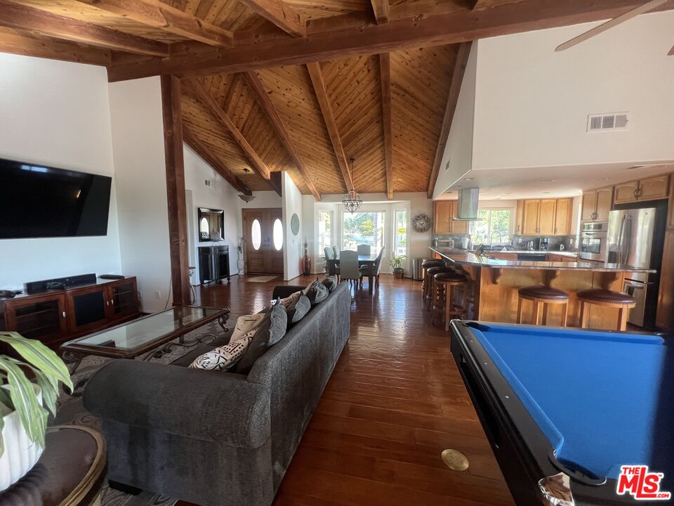 37200 Glen Oaks Road, Unit 3 Temecula, CA 92592 - Photo 28 of 42 a living room with furniture kitchen view and a large window