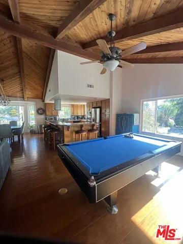 a view of swimming pool with seating space