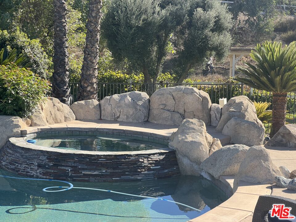 37200 Glen Oaks Road, Unit 3 Temecula, CA 92592 - Photo 31 of 42 a view of swimming pool with seating space