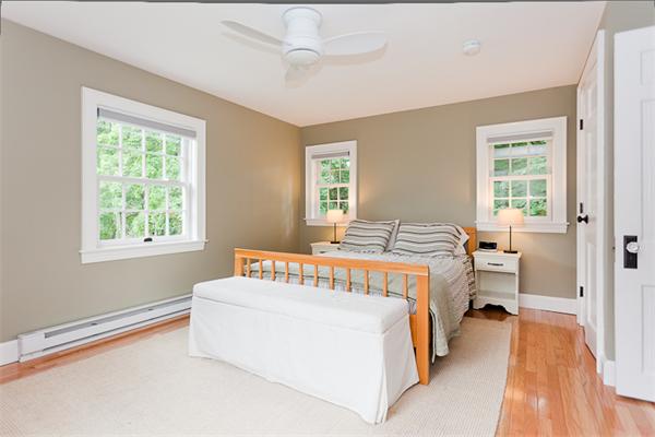 11 Stafford Road Newton, MA 02459 - Photo 13 of 21 a bedroom with a bed and a large window