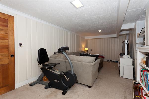 11 Stafford Road Newton, MA 02459 - Photo 17 of 21 a room with furniture a air conditioner and a window