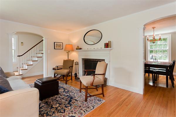 11 Stafford Road Newton, MA 02459 - Photo 6 of 21 a living room with furniture a flat screen tv and a fireplace