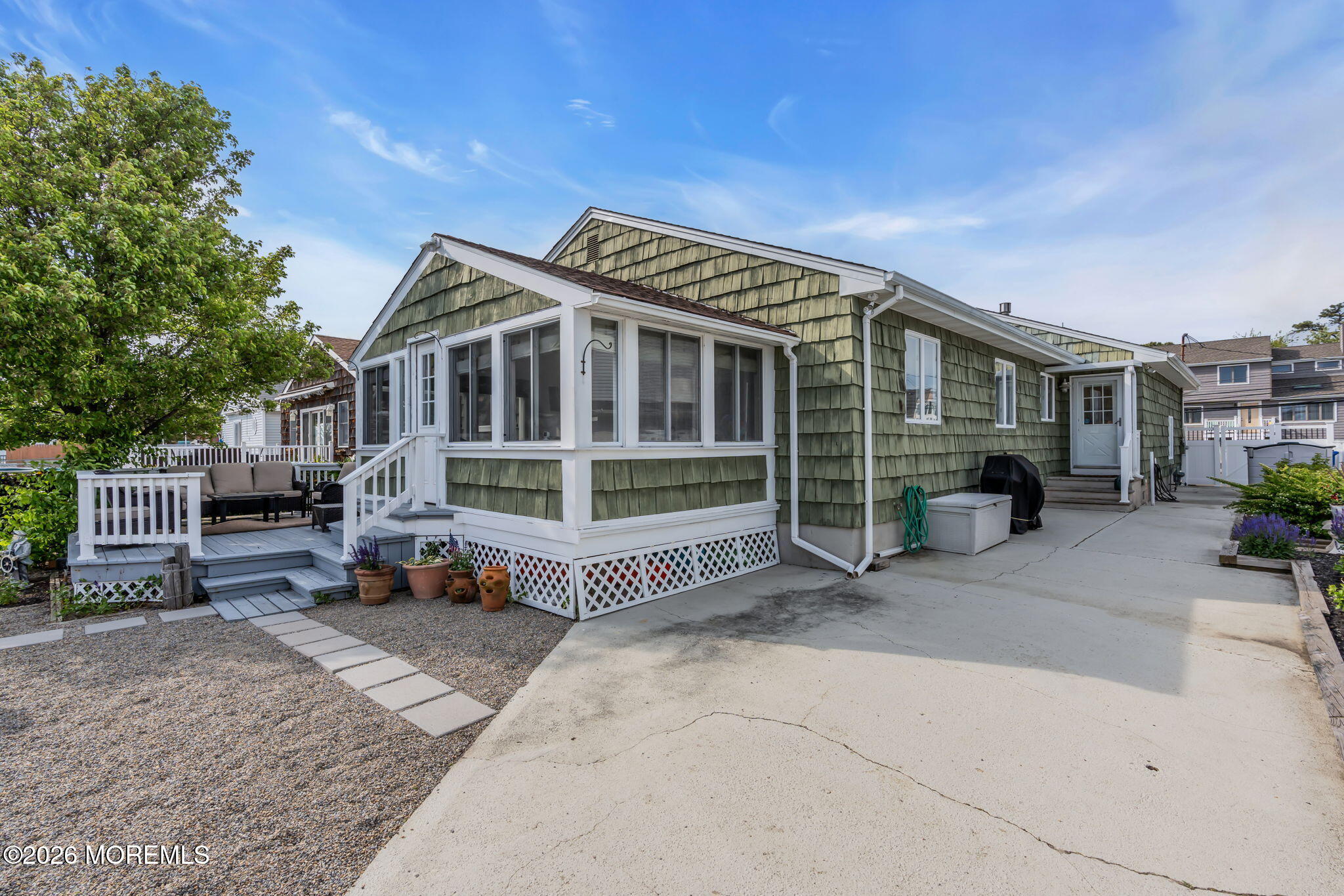 29 Green Island Road Toms River, NJ 08753 - Photo 50 of 63 a view of a house with a backyard and a patio