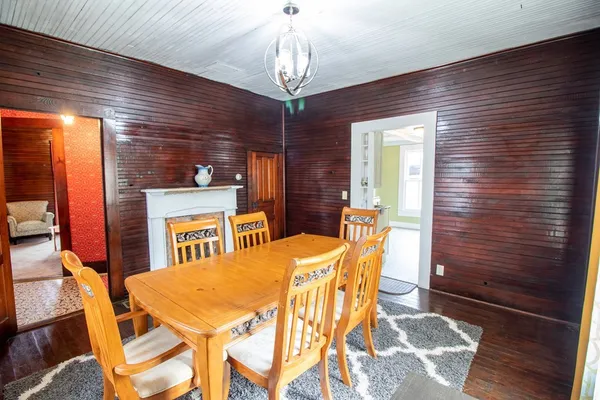 a dining room with furniture and window