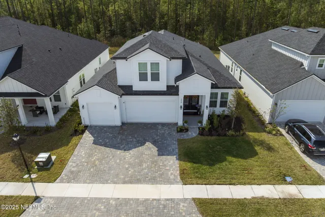 a view of swimming pool with outdoor seating