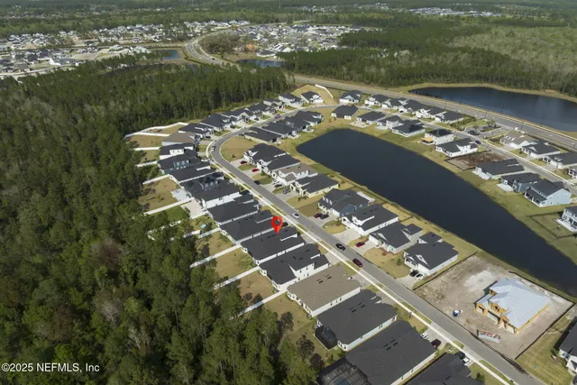 a view of a swimming pool with outdoor seating space