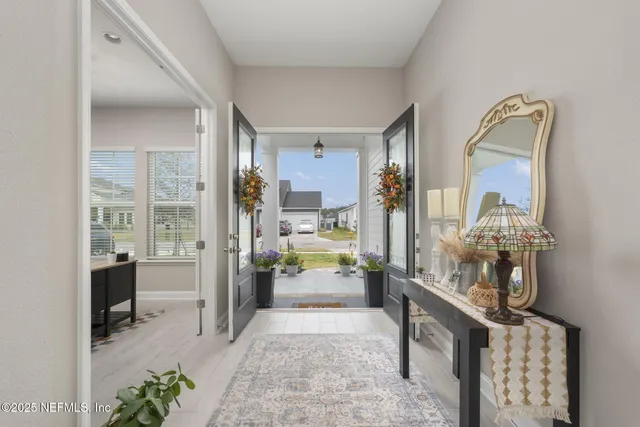 a work room with furniture and a window