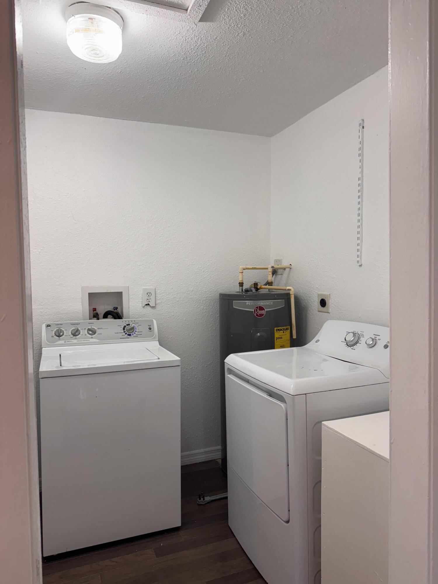 969 Plantation Road Key Largo, FL 33037 - Photo 17 of 26 a utility room with dryer and washer