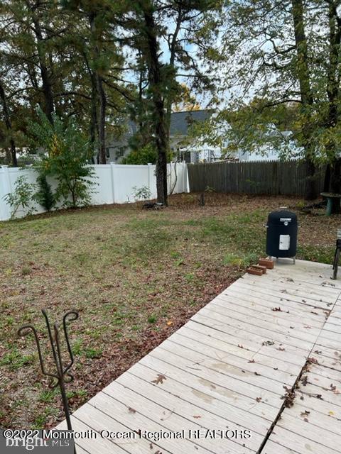 282 Privateer Road Manahawkin, NJ 08050 - Photo 15 of 18 a backyard of a house