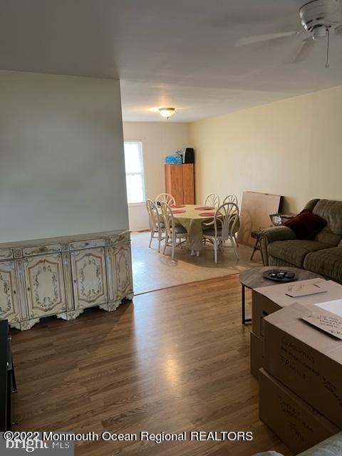 282 Privateer Road Manahawkin, NJ 08050 - Photo 5 of 18 a living room with furniture and wooden floor