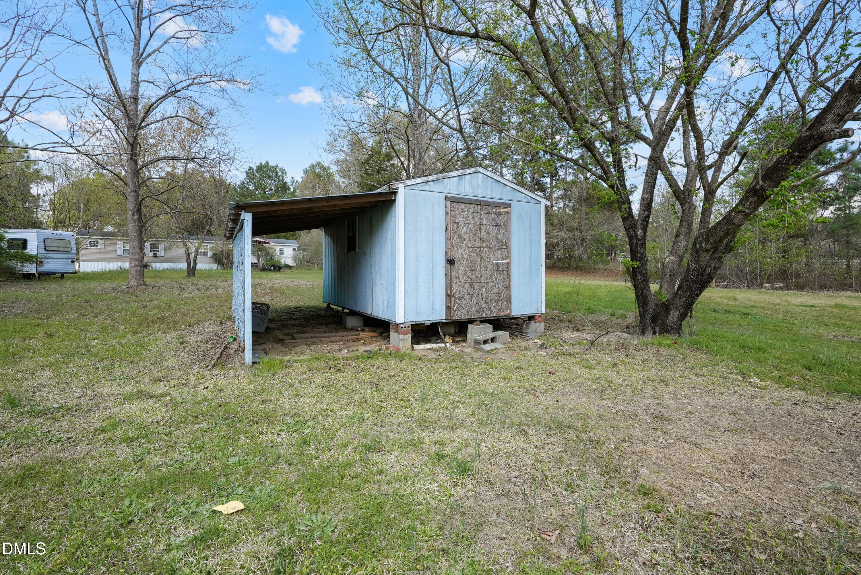 4077 Vass-Carthage Road Carthage, NC 28327 - Photo 6 of 23 a house view with a backyard space